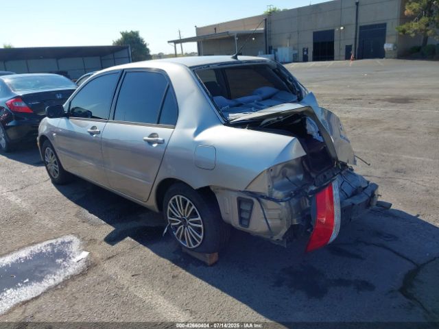 2002 MITSUBISHI LANCER JA3AJ26E32U053253 Photo 2