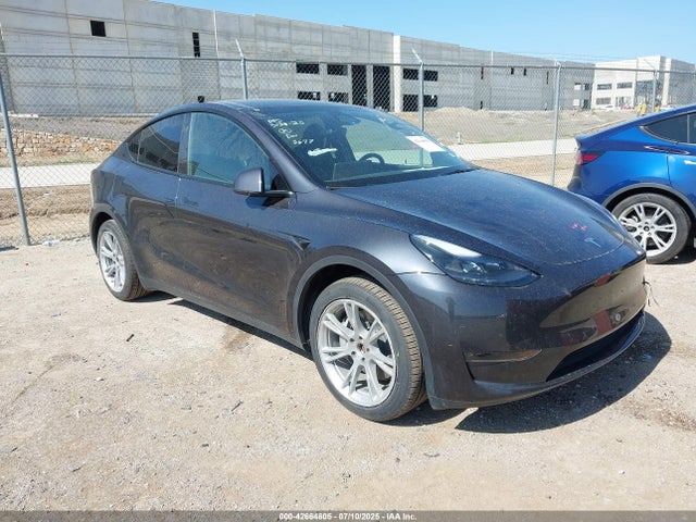 2024 TESLA MODEL Y 7SAYGDEE0RA285677 Photo 0