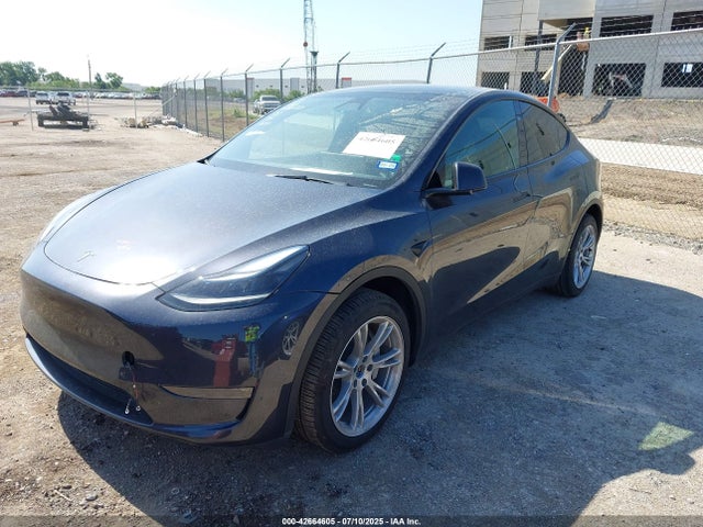 2024 TESLA MODEL Y 7SAYGDEE0RA285677 Photo 1