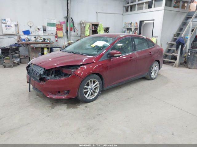 2015 FORD FOCUS 1FADP3F21FL270827 Photo 1