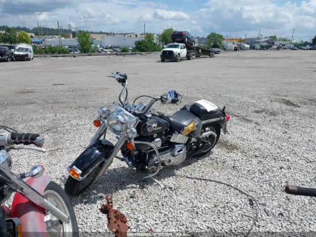 2004 HARLEY-DAVIDSON FLSTC 1HD1BJY104Y024273 Photo 1