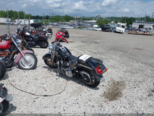 2004 HARLEY-DAVIDSON FLSTC 1HD1BJY104Y024273 Photo 2