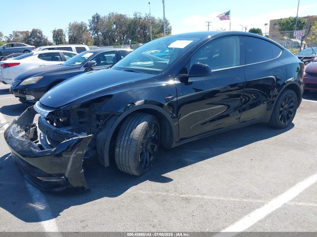 2023 TESLA MODEL Y 7SAYGDEE9PF906589 Photo 1