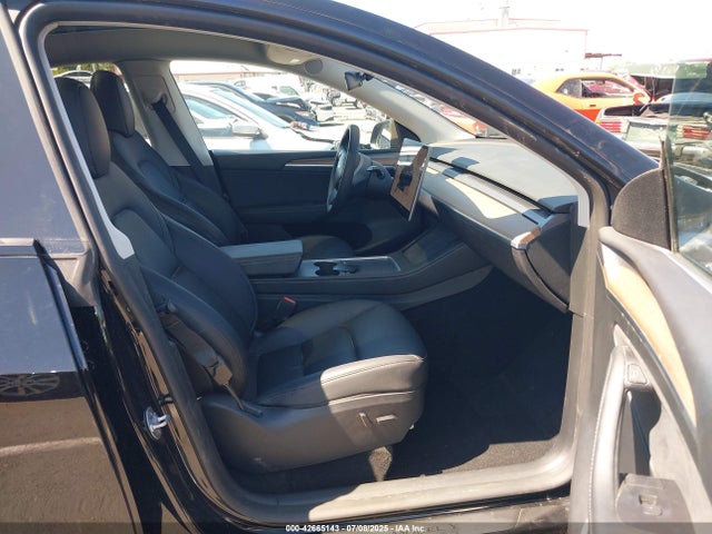 2023 TESLA MODEL Y 7SAYGDEE9PF906589 Photo 4