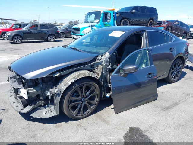 JM1GL1V59H1151392 Mazda py