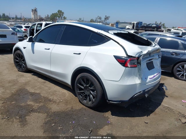 5YJYGDEE9MF118520 Tesla 2021