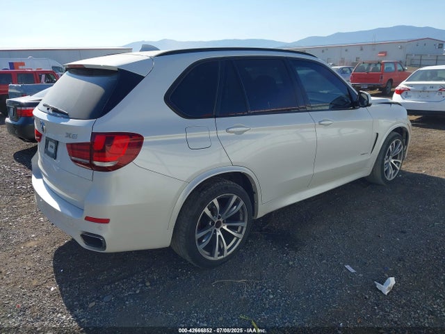 5UXKR0C58E0H21164 BMW 2014