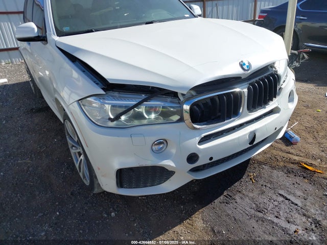 5UXKR0C58E0H21164 BMW 2014