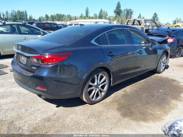 JM1GJ1T5XF1199067 Mazda 2015