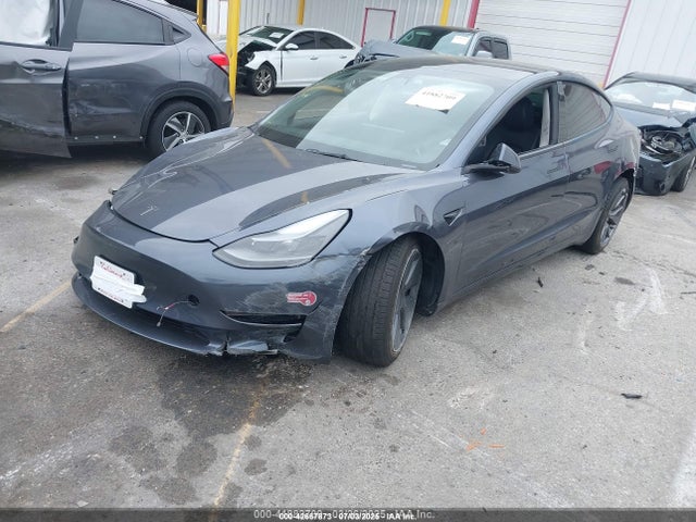 2023 TESLA MODEL 3 5YJ3E1EA5PF654381 Photo 1