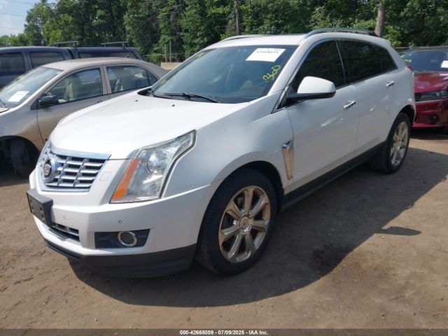 2014 CADILLAC SRX 3GYFNFE34ES677712 Photo 1