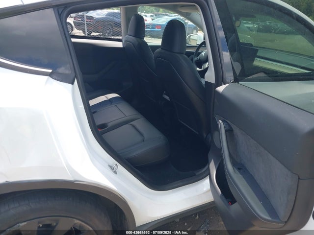 2023 TESLA MODEL Y 7SAYGDEE8PA059111 Photo 7