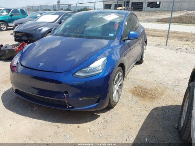 2023 TESLA MODEL Y 7SAYGDEE0PF618797 Photo 1