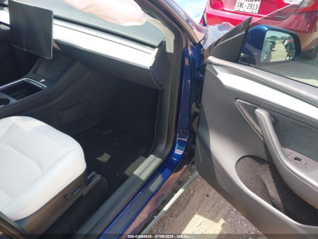 2023 TESLA MODEL Y 7SAYGDEE0PF618797 Photo 4