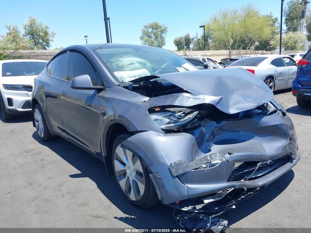 2023 TESLA MODEL Y 7SAYGDEE9PA106159 Photo 0