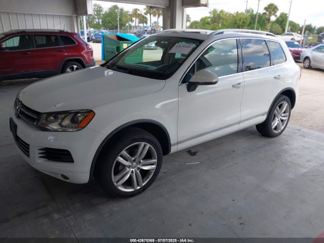 2014 VOLKSWAGEN TOUAREG WVGEP9BP2ED009360 Photo 1
