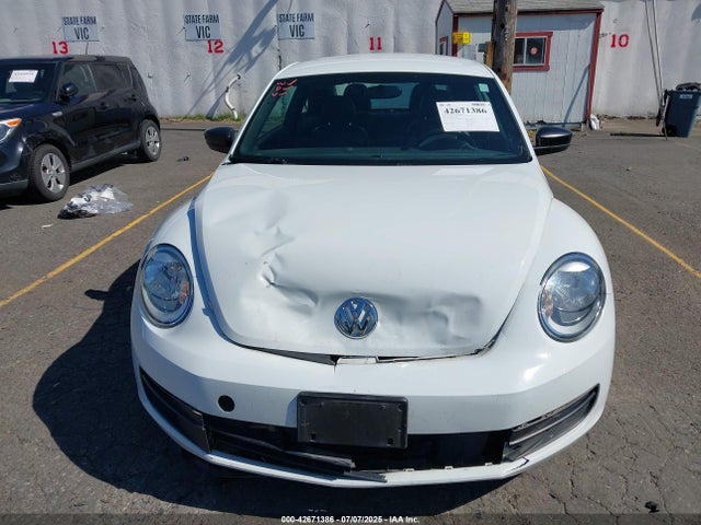 3VWF17AT7GM607395 Volkswagen Beetle