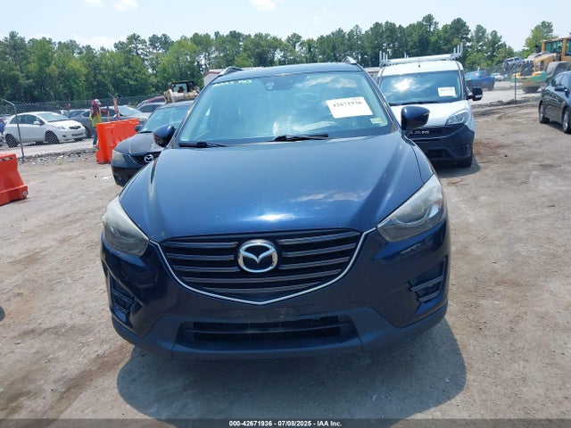 JM3KE4DY9G0647581 Mazda py