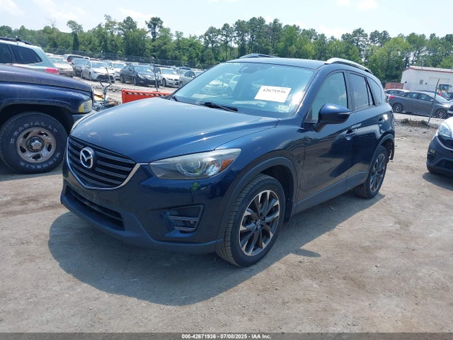 JM3KE4DY9G0647581 Mazda py