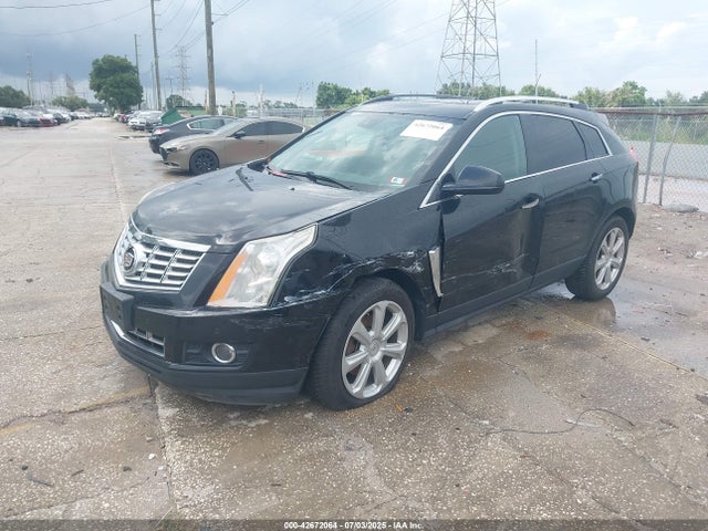 2015 CADILLAC SRX 3GYFNGE30FS634363 Photo 1