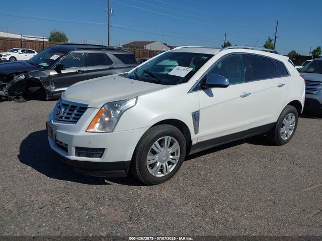2014 CADILLAC SRX 3GYFNEE32ES676598 Photo 1