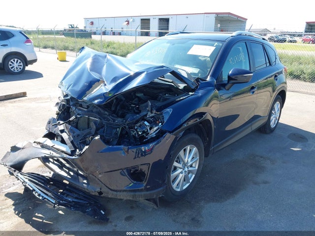 JM3KE4CY8G0778339 Mazda py