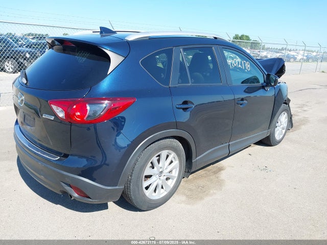 JM3KE4CY8G0778339 Mazda py