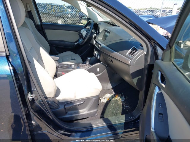 JM3KE4CY8G0778339 Mazda py