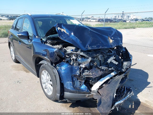 JM3KE4CY8G0778339 Mazda py
