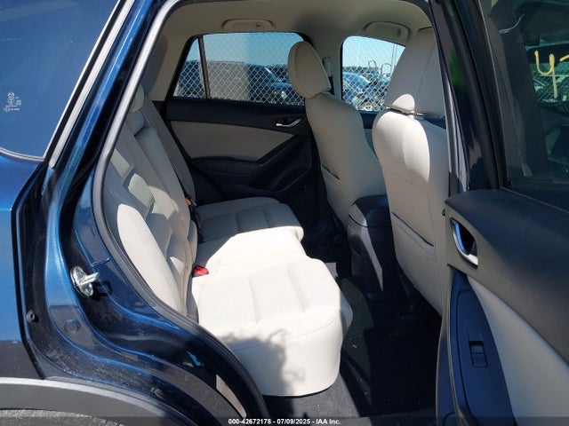 JM3KE4CY8G0778339 Mazda py