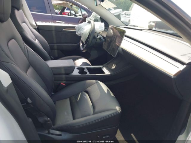 2023 TESLA MODEL Y 7SAYGAEE6PF709703 Photo 4