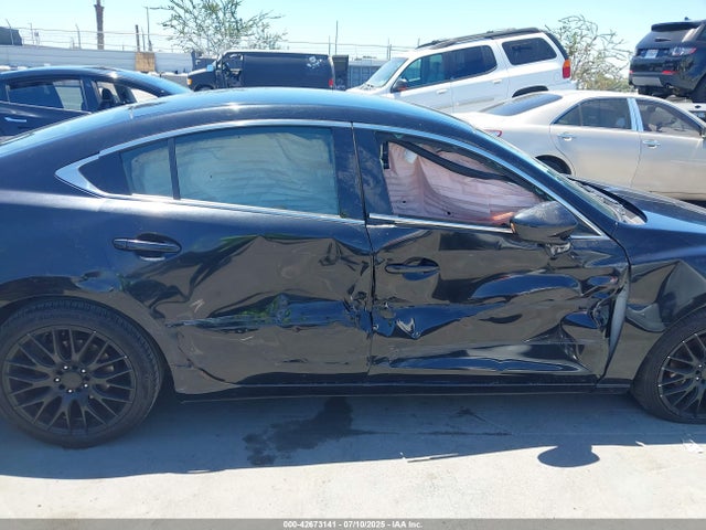 JM1GJ1U55F1219496 Mazda 2015