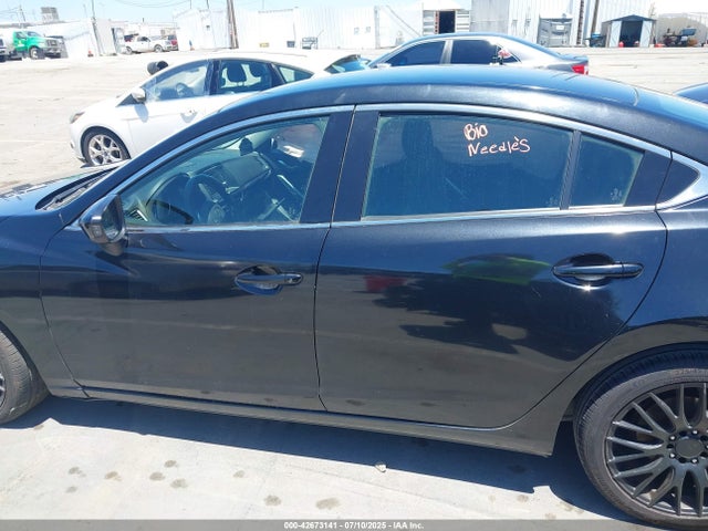 JM1GJ1U55F1219496 Mazda 2015