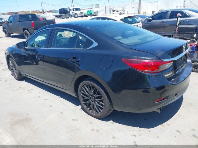 JM1GJ1U55F1219496 Mazda 2015