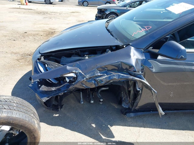 Tesla Model Y 2024 7SAYGAEE2RF124068 Image 6