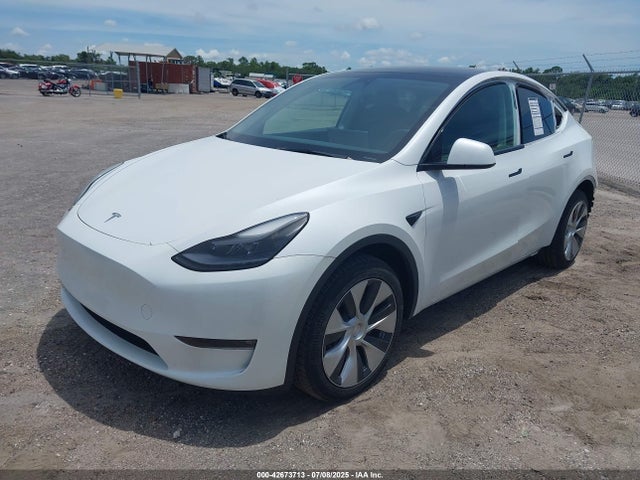 2023 TESLA MODEL Y 7SAYGAEE2PF775097 Photo 1