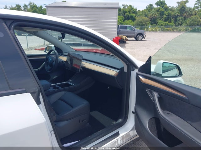 2023 TESLA MODEL Y 7SAYGAEE2PF775097 Photo 4