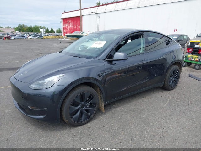 2025 TESLA MODEL Y 7SAYGDEE4SF289725 Photo 1