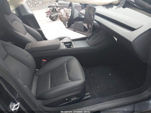 2025 TESLA MODEL 3 5YJ3E1EA3SF915449 Photo 4