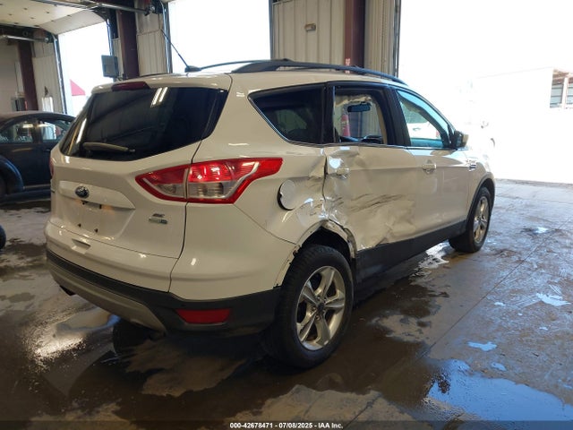 1FMCU9GX0EUB01916 Ford 2014