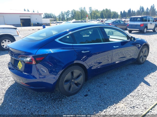 5YJ3E1EA9LF799269 Tesla 2020