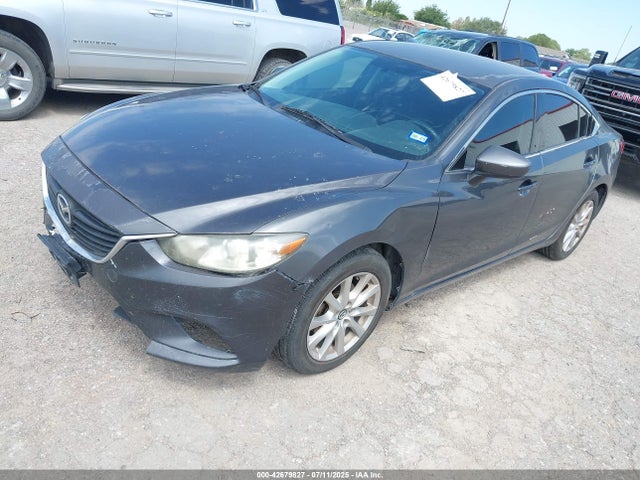 JM1GJ1U54F1180142 Mazda 2015