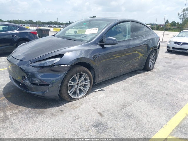 2024 TESLA MODEL Y 7SAYGDED8RF038224 Photo 1