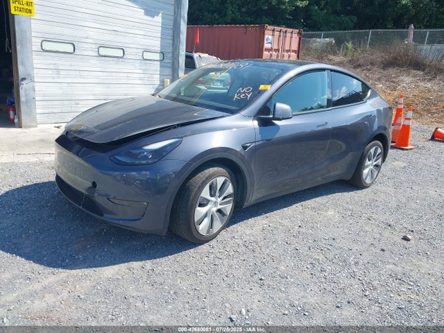 2023 TESLA MODEL Y 7SAYGDEEXPF927368 Photo 1