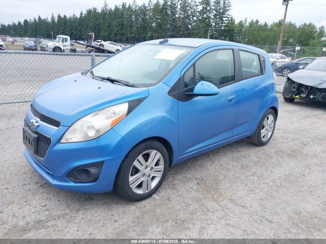 Chevrolet ll0 2014 KL8CD6S99EC408186 Image 2