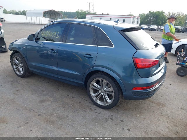 2016 AUDI Q3 WA1GFCFS6GR000611 Photo 2