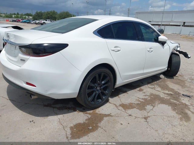Mazda py 2017 JM1GL1V54H1155916 Image 4