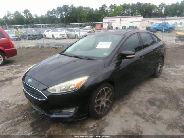 2015 FORD FOCUS 1FADP3F27FL304883 Photo 1