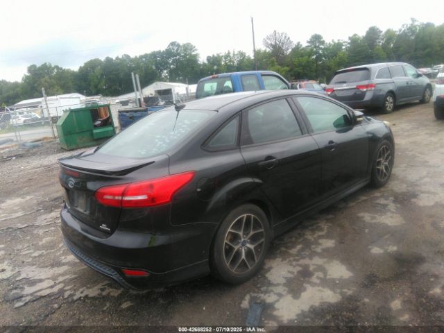 2015 FORD FOCUS 1FADP3F27FL304883 Photo 3