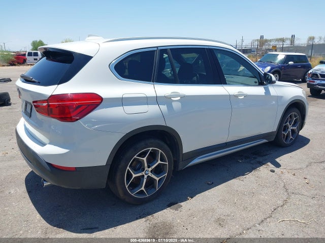 WBXHU7C3XJ5L07088 BMW X1